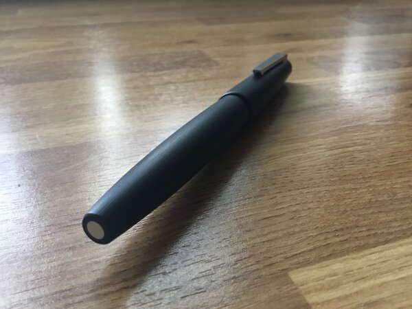 LAMY 2000 showing steel disc at end of piston turning knob.jpeg